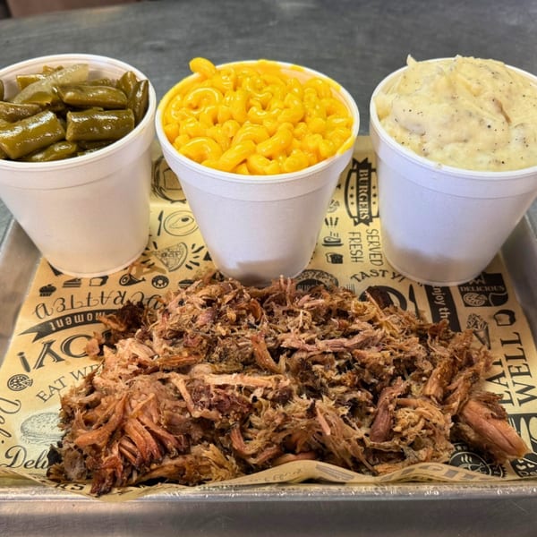 Baby Back Blues BBQ pulled pork with sides of green beans, mac and cheese, and mashed potatoes.